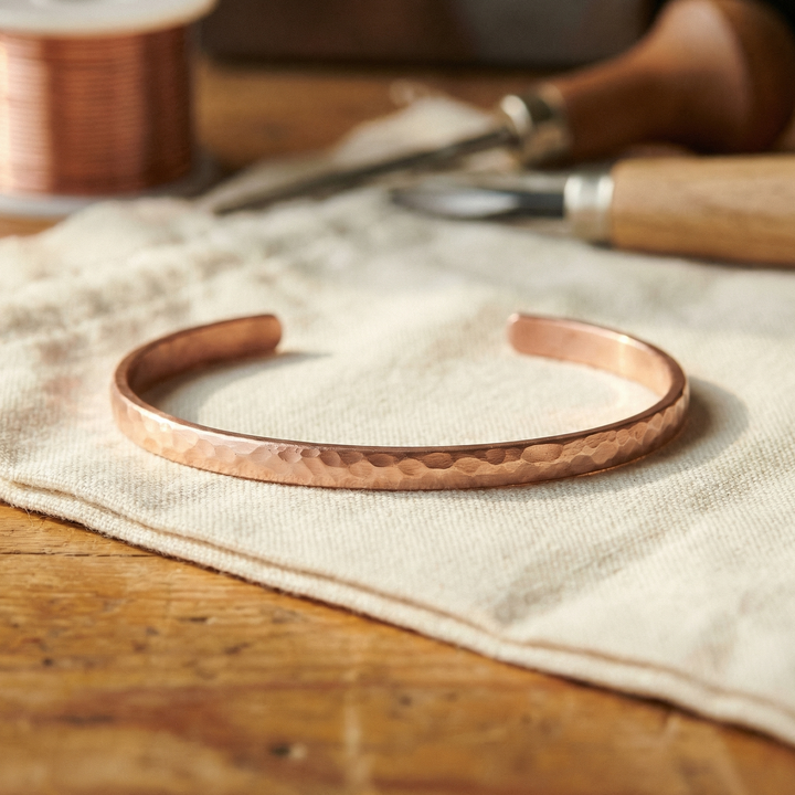 "Pulseira de Tornozelo Ana Zagreb em Bronze" can be rewritten as "Pulseira de Tornozelo Ana Zagreb de Bronze".